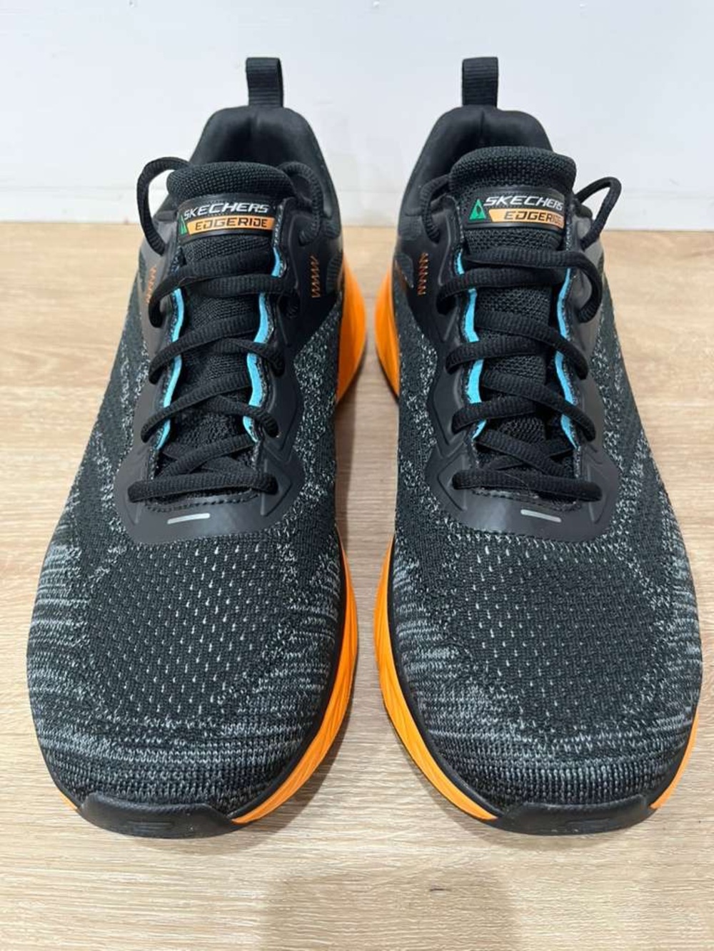 Skechers Men's Black Knit Sneakers with Orange Midsoles